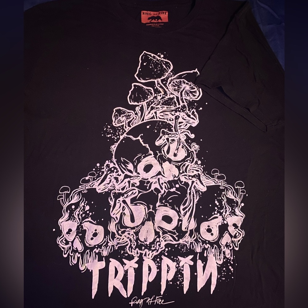 Black “Trippin” T-shirt including Mushrooms and A Skull.